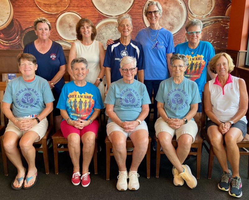 A group of Cape Region senior athletes gathered at Iron Hill Brewery July 15 to chat about their upcoming participation in the National Senior Games, a biennial competition in more than 20 sports scheduled for July 24-Aug. 4 in Des Moines, Iowa. The competitors and their chosen sport include in back (l-r) Colleen Perry (golf), Lisa Hutchins (golf), Jane Kuhfuss (golf), Mariah Burton Nelson (cornhole) and Linda Frese (golf). In front are Marie Murray (pickleball), Sandy Oropel (pickleball and golf), Judy Wetzel (golf), Maryann Rapposelli (track & field, javelin) and Jackie Everett (golf). FRITZ SCHRANCK PHOTO